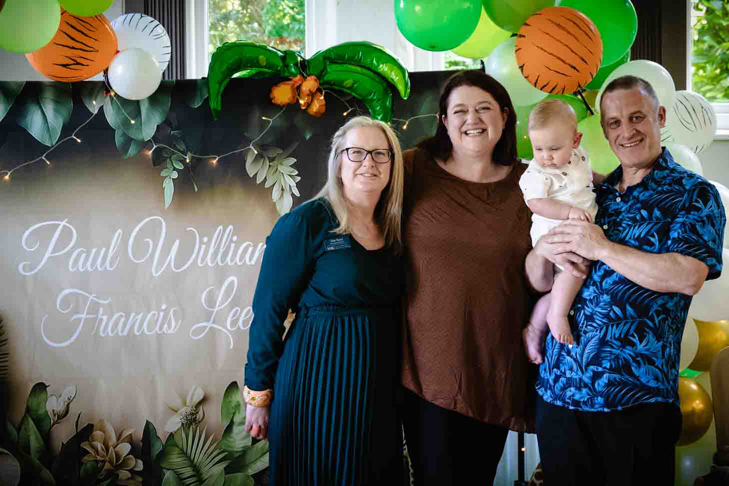 Deb Reed Celebrant Colchester Essex, officiating at Sebestians baby naming while he plays with his dad.